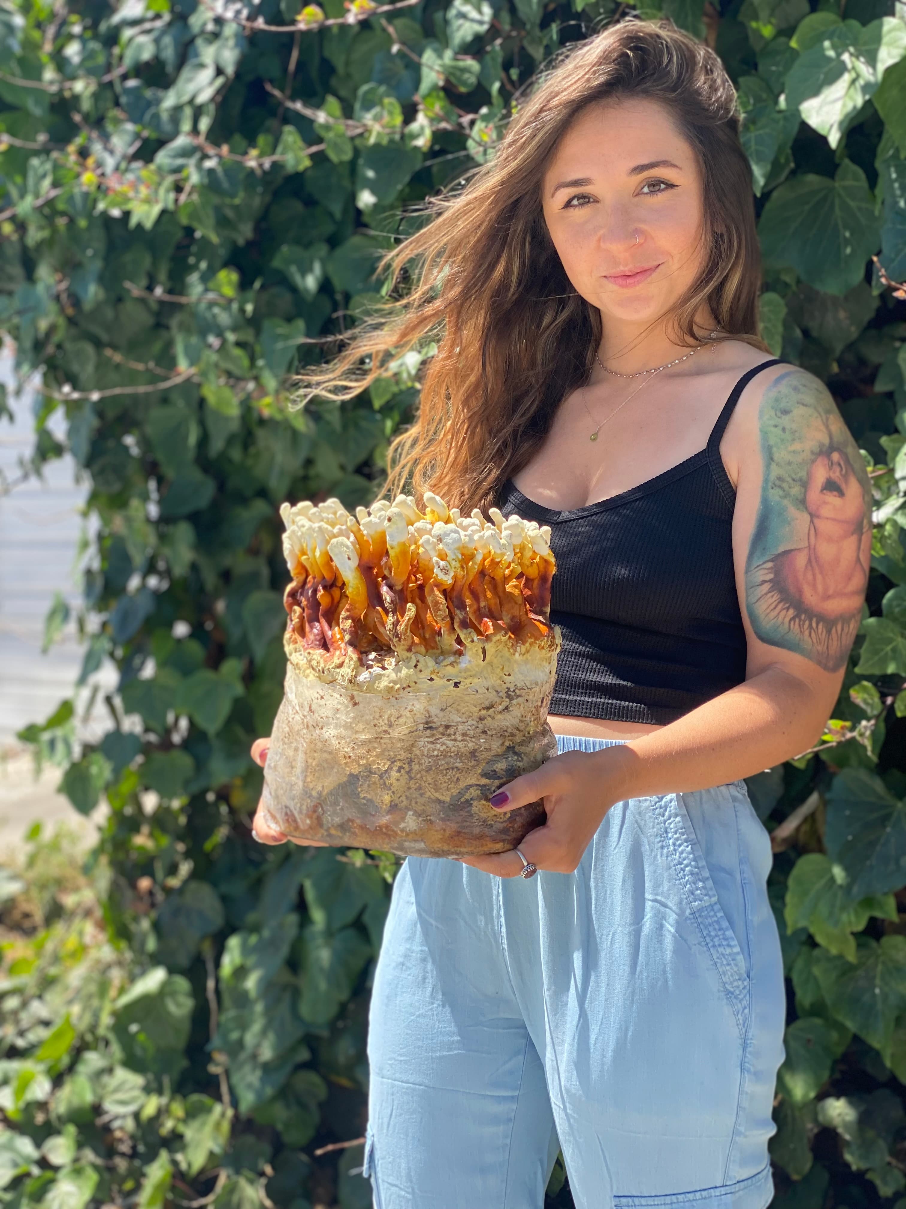 Model with reishi mushroom block